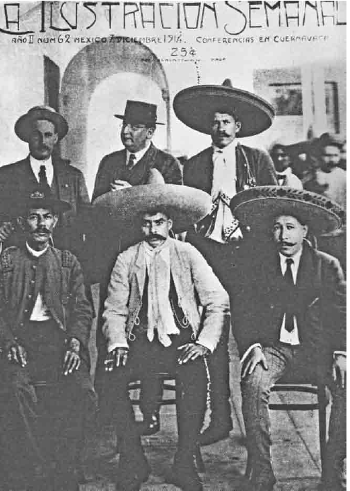 En Xochimilco (1914), Sentados: BenjamAi??n Argumedo, Zapata y Manuel Palafox: atrA?s Ignacio Ocampo, George Carothers y Amador Salazar